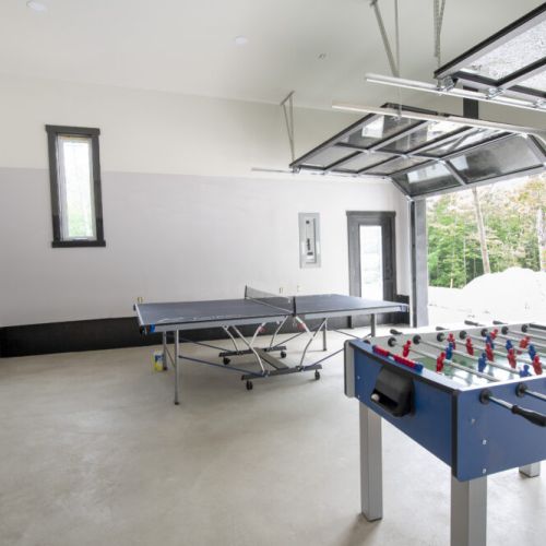 Enjoy a friendly/competitive game of foosball and table tennis in the garage games area.