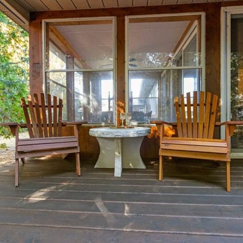 Take a break from the busy day in the Adirondack chairs overlooking the yard.