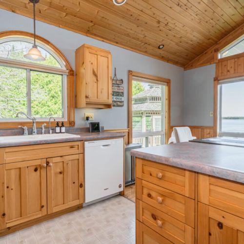 The large kitchen sink and dishwasher make cleaning up as breezy as the wind off the lake.