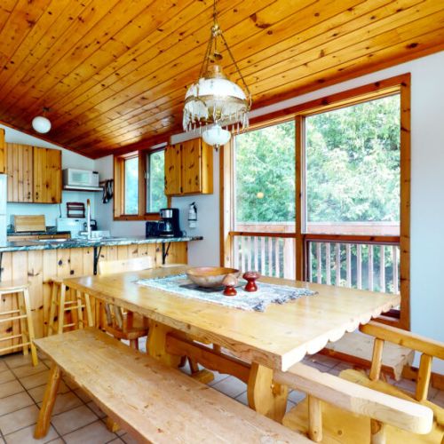 Evening meals or morning coffee while enjoying the amazing views at the sturdy dining table.