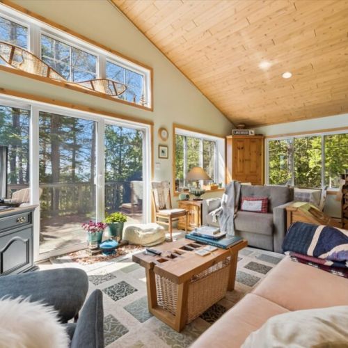 Curl up with a book, sip your morning coffee, or simply enjoy the tranquil views from this bright and inviting living space.