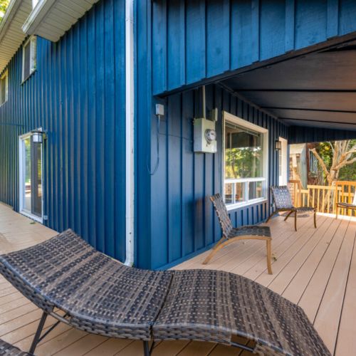 Kick back on the spacious deck with comfy lounge chairs and forest views—perfect for morning coffee, evening wine, or soaking up the peaceful vibes of your nature getaway. Ideal for couples, families, or group retreats.