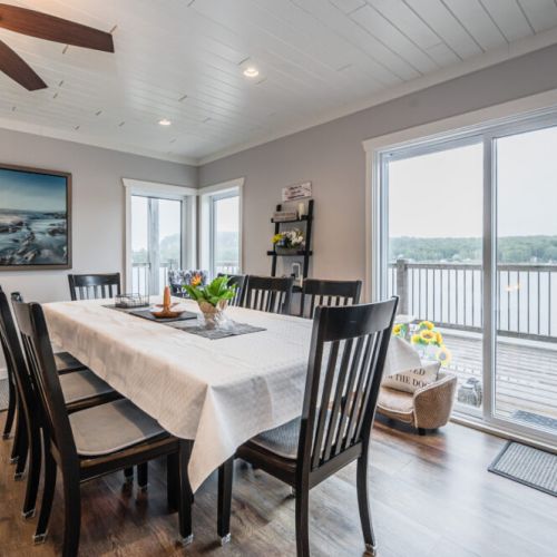Enjoy meals with a view—floor-to-ceiling windows overlooking Georgian Bay.