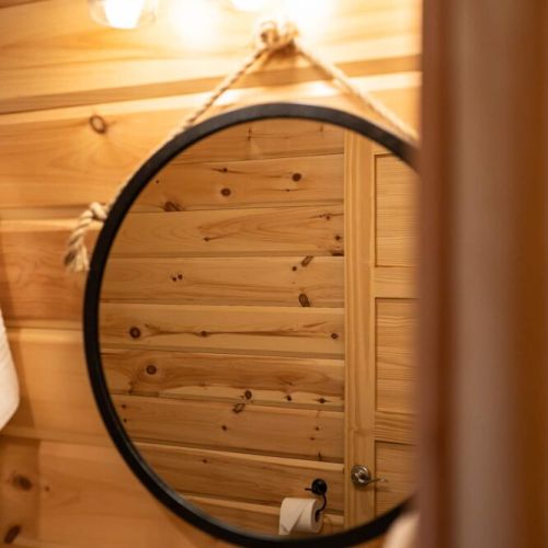 Main floor washroom with 3 pc set up, and stand up shower located right at the entrance of the home.