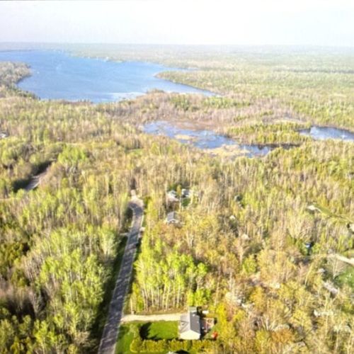 Tucked deep in the trees with endless lake views and total privacy — your peaceful getaway starts here.