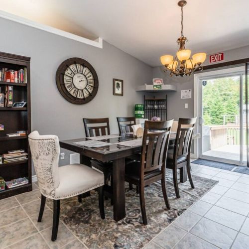 Enjoy dining with a stunning view of the backyard, with over 1.5 acres of pure nature. Look out the window and watch the deer feed at the back feeder right outside!