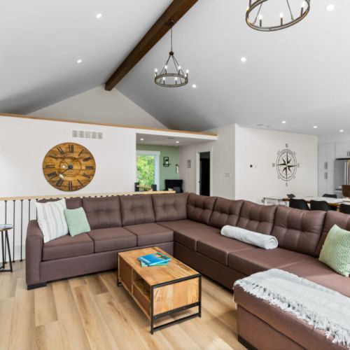 The open-concept living area offers plenty of comfortable seating for the whole group.