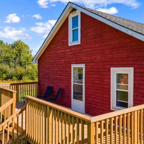 The new wraparound-style deck adds even more outdoor space to relax and take in the peaceful surroundings.