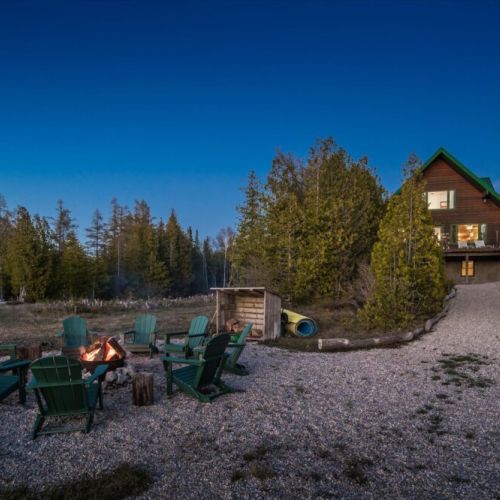 The perfect spot to unwind after a day on the water — fireside at Paradise Pines.
