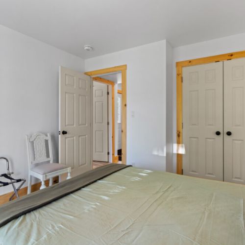This comfortable bedroom offers plenty of storage and a peaceful place to relax after a day of adventure.