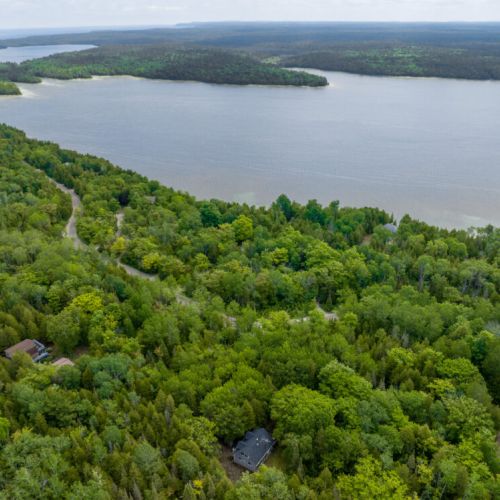 Bearfoot Lodge rests fully secluded on a private lot in the Cameron Lake - National Park Community.