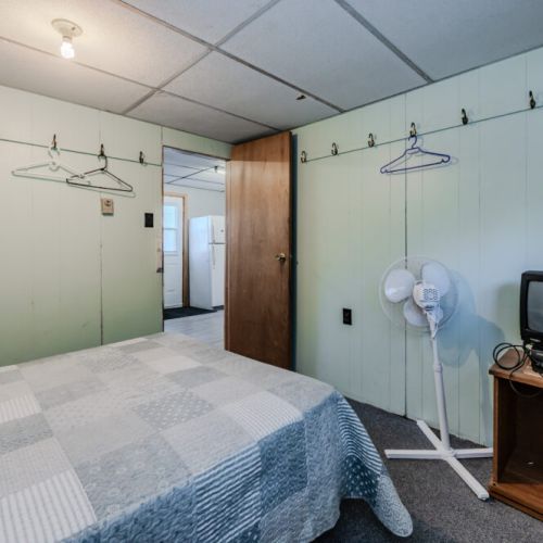 A different angle showing the window view and ample hanging space for clothes.