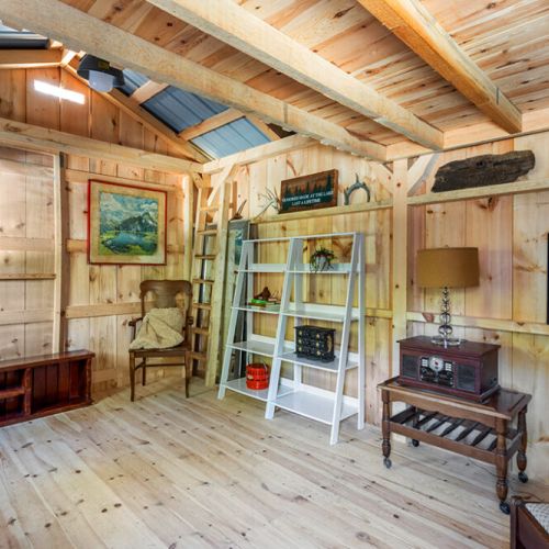 The second bunkhouse offers a charming retreat perfect for reading, relaxing, or seasonal accommodations.