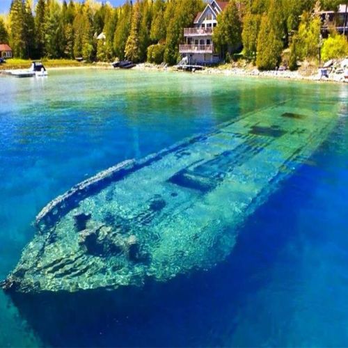 Explore nearby Tobermory and its famous shipwrecks in stunning turquoise waters.