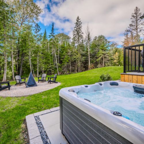 Relax in the hot tub or gather around the fire pit for a perfect blend of relaxation and outdoor fun.