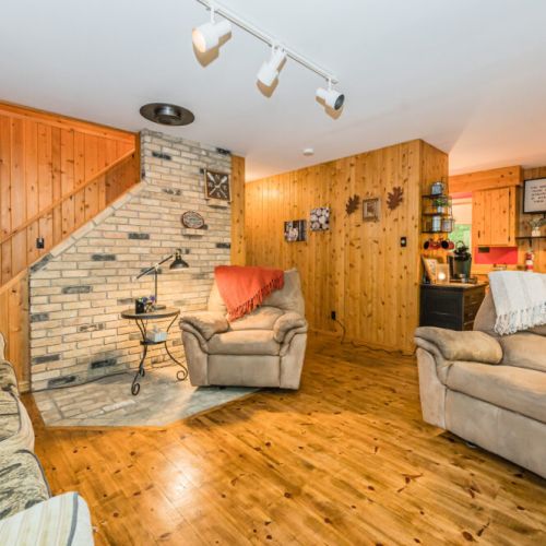Comfortable seating and delicately decorated, with hallway access to the Master bedroom.