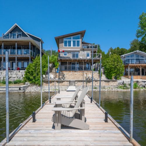 Private dock access with direct entry to the bay for boating, swimming, and more.