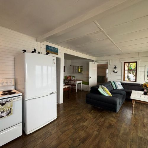 Comfortable seating flows into the kitchen for easy gatherings.
