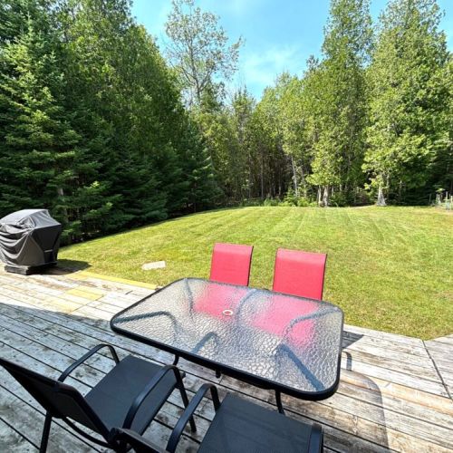 Grill, dine, and enjoy the full backyard view—your private outdoor retreat awaits.