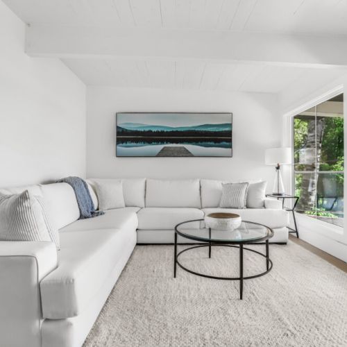 A soft and airy lounge space made for lazy mornings, movie nights, and afternoon naps.