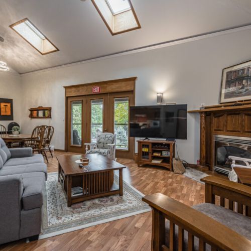 The large open concept living area exits to a massive wrap-around deck and lounge. The skylights are an incredible way to enjoy 1 of 12 UNESCO Dark Skies in Canada.