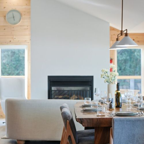 This open-concept dining area offers breathtaking views of the lake. The modern design and comfortable seating make it the perfect place to relax and unwind after  a day of adventure in Tobermory.