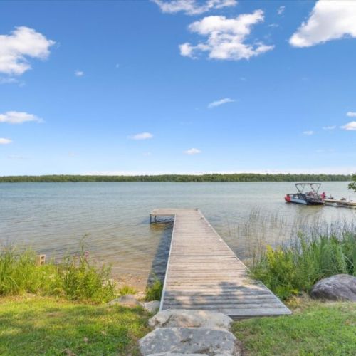 Private dock access for swimming, boating, or simply soaking up the serene lake views on a sunny day.