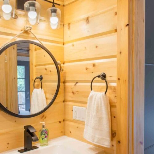 Bright and stylish vanity with thoughtful touches.