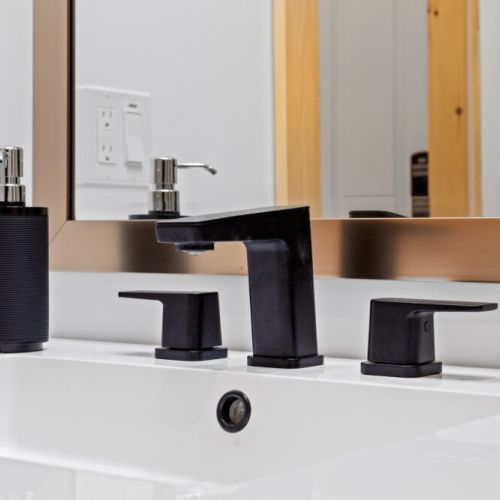 Modern fixtures and clean, contemporary finishes can be found throughout the cottage.
