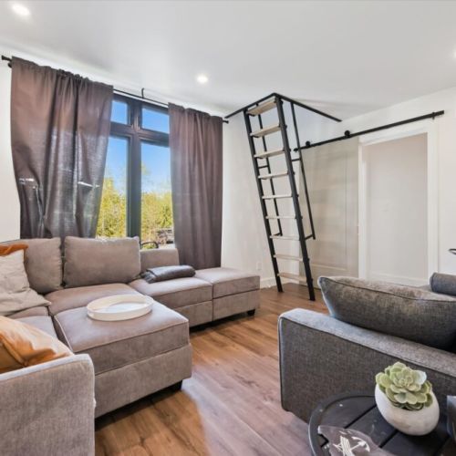 Fun loft-style sleeping area accessed by ladder — perfect for kids and adventurous guests.