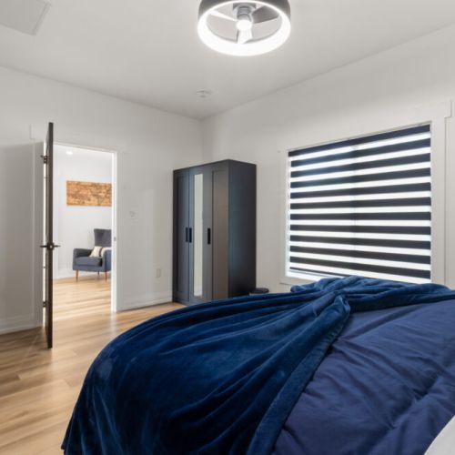 Wake up refreshed in a comfortable bedroom designed for a restful stay.