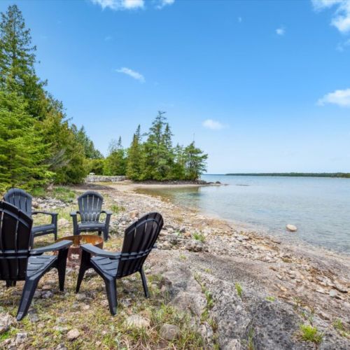 Unwind by the fire with the sound of waves and a front-row seat to the bay’s natural beauty.