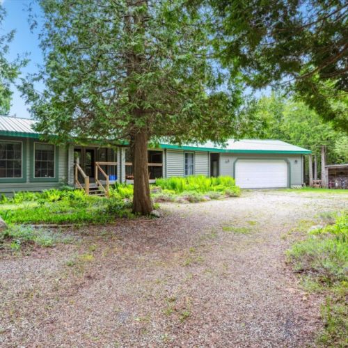 Tucked among towering trees, Whisk You Away welcomes you with rustic charm, lush greenery, and total privacy—ideal for a quiet escape or forest getaway just minutes from Grey Bruce attractions.