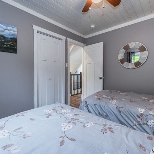 Bedroom 5: Cozy bedroom with two beds—perfect for kids or additional guests.