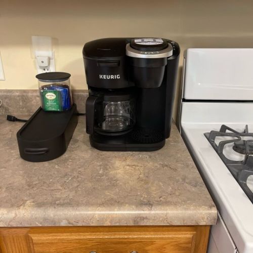 Start your mornings right with a Keurig coffee maker, offering options for both Keurig pods and traditional coffee grinds to suit everyone's tastes.
