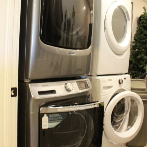 Dual stackable washer and dryer sets are onsite.