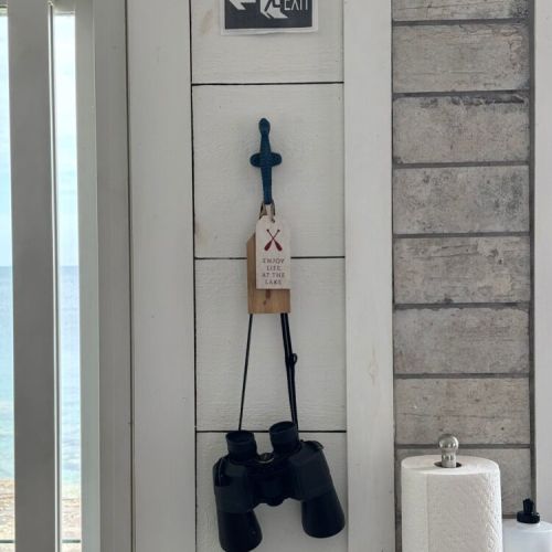 Binoculars on a hook for birdwatching or spotting boats.