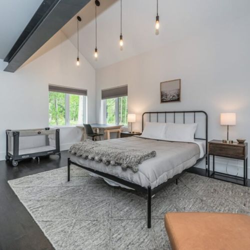 Lower level granny/new parents suite. This is the perfect spot to host the little ones. This room features an ensuite bathroom and changing counter.