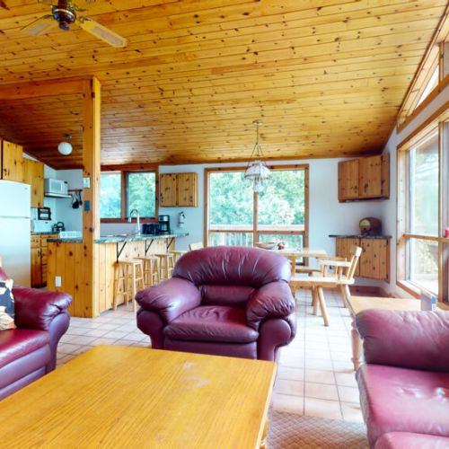 Spacious and inviting, with wonderful views all around through the large windows.