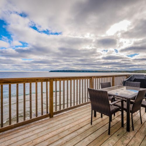 Enjoy your meals al fresco on this large deck, with panoramic views of the crystal-clear waters and surrounding landscape.