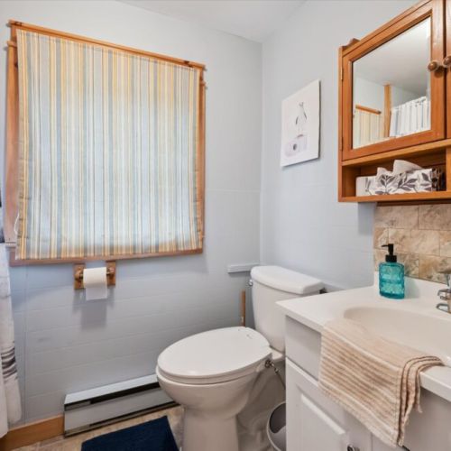 Clean and bright main bathroom with everything you need