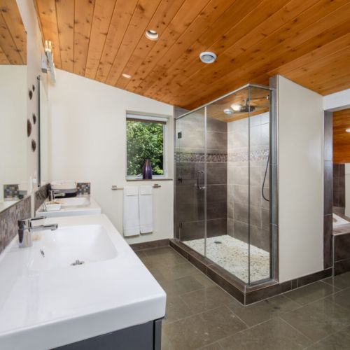Refresh in the oversized walk-in glass shower after a day exploring the Bruce Peninsula.