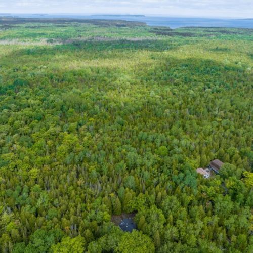 Bearfoot Lodge rests fully secluded on a private lot in the Cameron Lake - National Park Community.