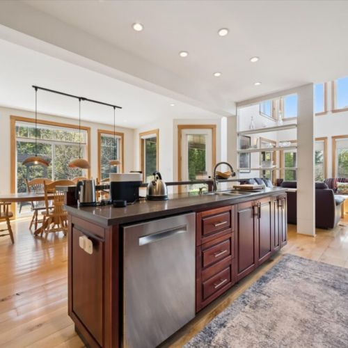 Expansive chef’s kitchen with large island and open-concept layout.