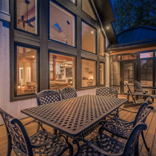 Enjoy cozy evenings on this vacation rental's private deck, complete with dining area, and scenic forest views—perfect for outdoor meals, relaxation, and unforgettable getaway moments.