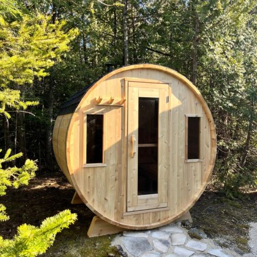Rejuvenate in a handcrafted cedar barrel sauna tucked among the pines—your private wellness getaway.