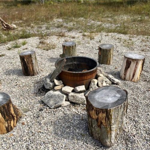 Gather around the outdoor firepit area for evenings under the stars by the shoreline.