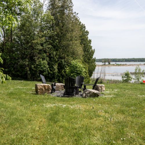 Fire pit spot with a beautiful view of the bay for sunset hangs and night skies.