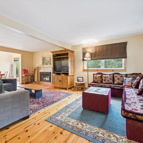 Cozy living room with fireplace—perfect for unwinding after a day outside