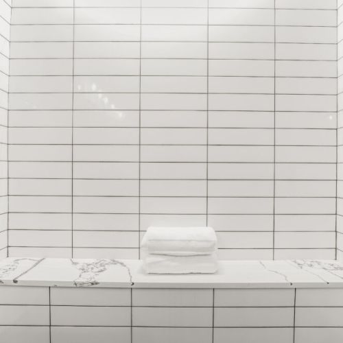 Deep tiled tub and shower combo perfect for kids or a long soak after the lake.